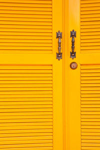 Full frame shot of yellow closed door