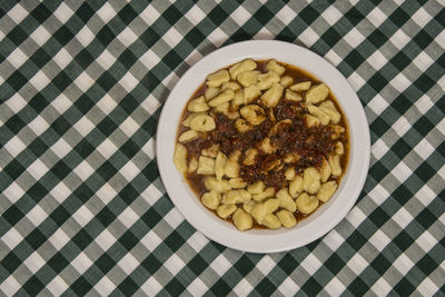 Directly above shot of food in plate on table