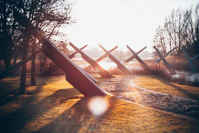 Scenic view of park against sky during sunset