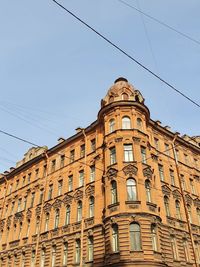 Low angle view of skyscraper against clear sky