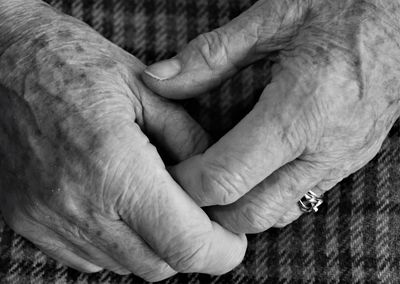 Close-up of couple holding hands