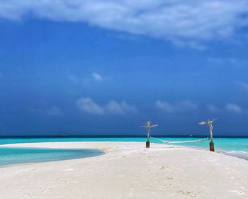 Scenic view of beach against sky