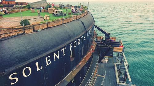 High angle view of text on ship at sea