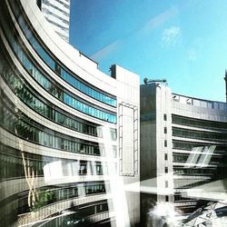 Low angle view of modern building against sky