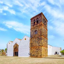 Low angle view of historic building against sky