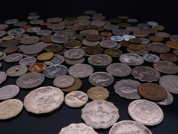 High angle view of coins on table