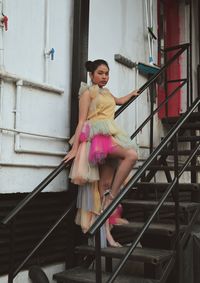 Portrait of woman on staircase