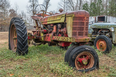 Abandoned tractor on field