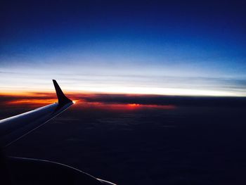 Aerial view of landscape against sky at sunset