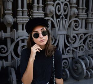 Portrait of young woman wearing sunglasses