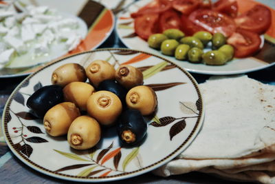 High angle view of fruits in plate on table