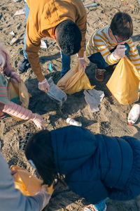 High angle view of people standing on land