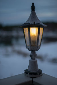 Low angle view of illuminated lamp