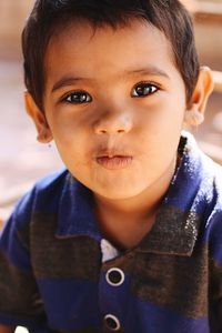 Portrait of cute boy at home