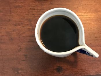 Directly above shot of black coffee on table