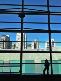 Low angle view of building against clear blue sky