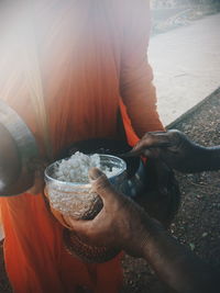 Close-up of man holding ice cream