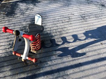 High angle view of bicycle on shadow