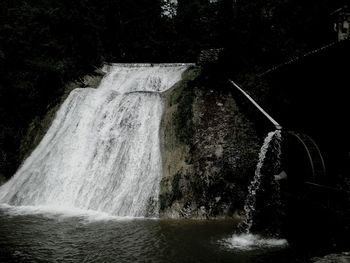 Water flowing through waterfall