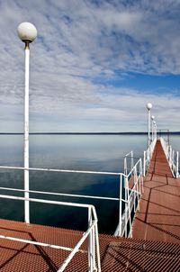 Sailboat on sea against sky