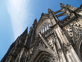 Low angle view of cologne cathedral against sky