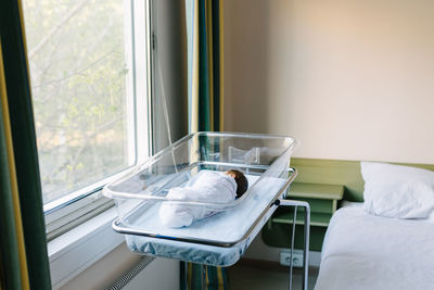 View of bed in window