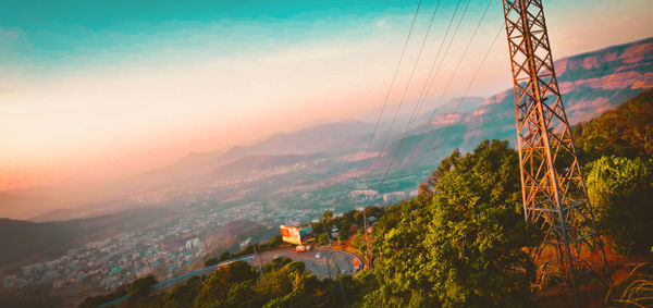 Scenic view of mountains against sky during sunset