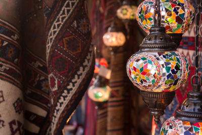 Close-up of antique lanterns at temple