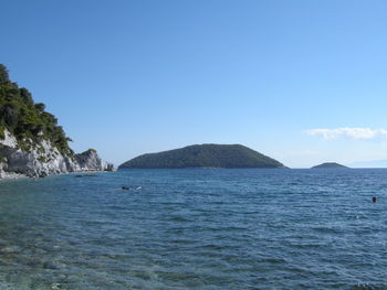 Scenic view of sea against clear sky