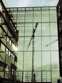 Low angle view of building against cloudy sky