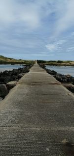 Surface level of road against sky