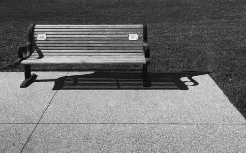 A empty memorial park bench, oakville ontario.