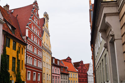 High section of buildings in old town against sky