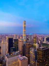 Modern buildings in city against sky