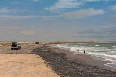 Surf fishing on the skeleton coast in the north of swakopmund, namibia