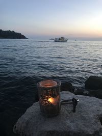 Scenic view of sea against sky at sunset