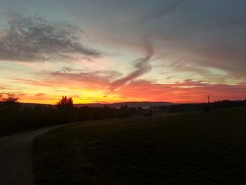 Scenic view of landscape at sunset