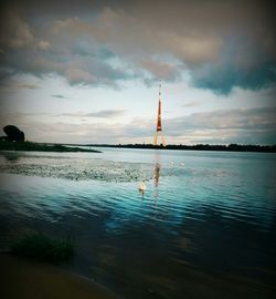 Reflection of clouds in calm sea