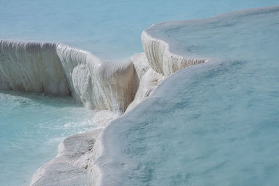 Panoramic view of sea against blue sky