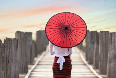 Red umbrella woman