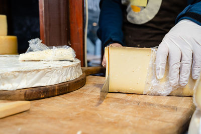 Man preparing food on cutting board