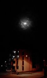Illuminated street light at night