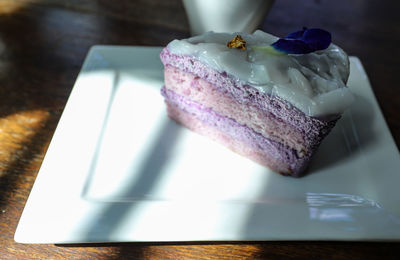 Close-up of cake served on table