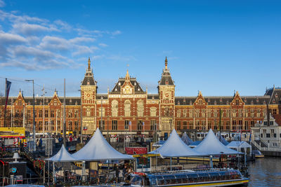 Buildings in city against sky