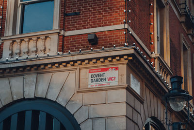 Low angle view of sign on building