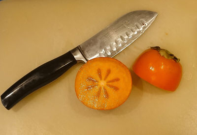 High angle view of orange fruit on table