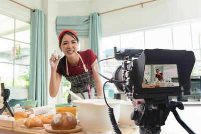 Portrait of woman working at home