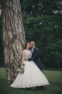 Couple kissing in a tree