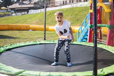 Full length of boy playing outdoors