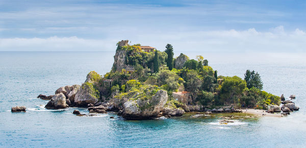 Scenic view of island in sea